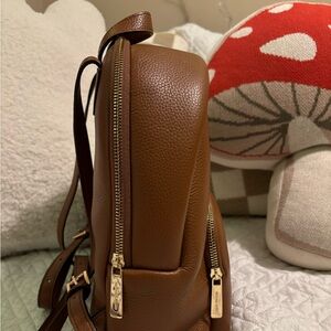 Michael Kors medium sized brown backpack